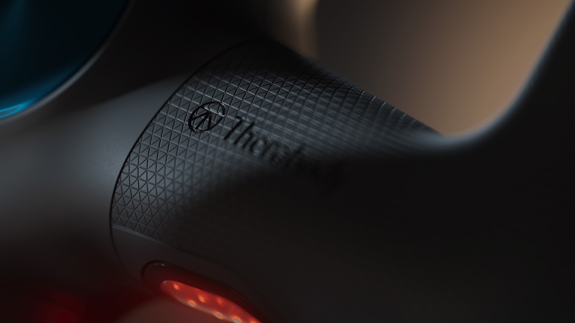 Animated sequence: A close-up of a textured surface with a red light glowing beneath it, showing the brand name "Therabody" on a black background.
