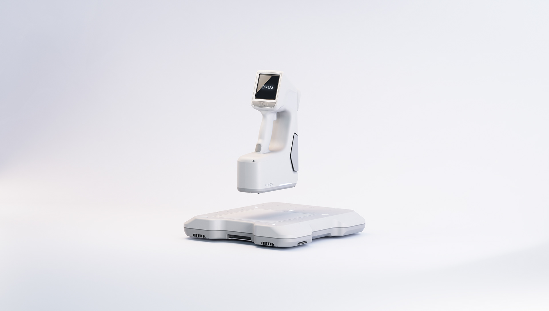 A sleek, white portable precision device with a digital screen displaying "OXOS" on its stand.