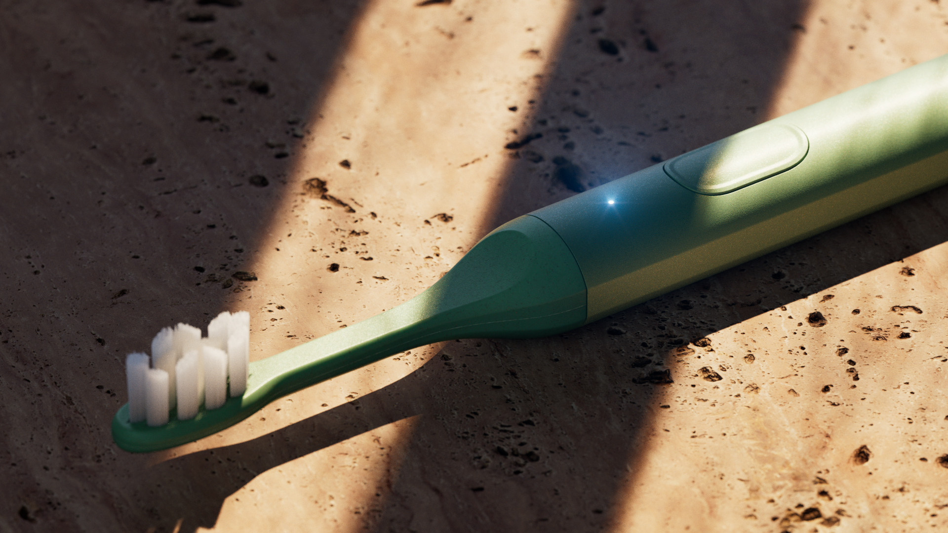 A green electric toothbrush lies on sandy ground, its bristles facing upwards, with a glowing button at the top.