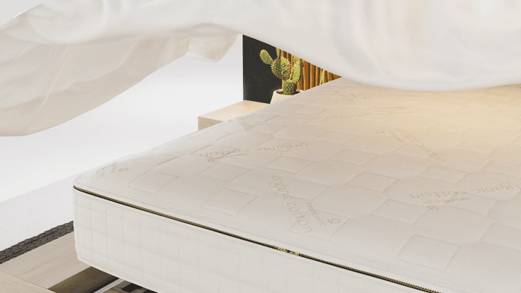 Animated sequence: A close-up of a white mattress with natural fiber bedding, showing its texture and softness.