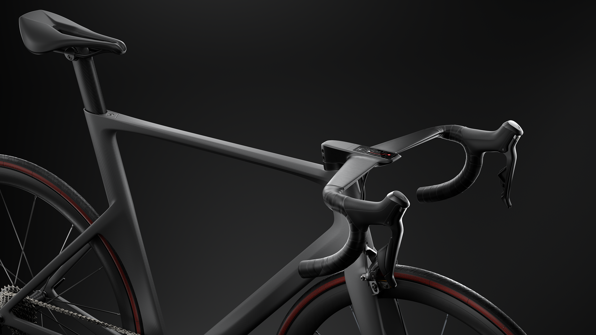 A carbon fiber bicycle frame with aerodynamic design, featuring a matte black finish and red accents on the wheels.