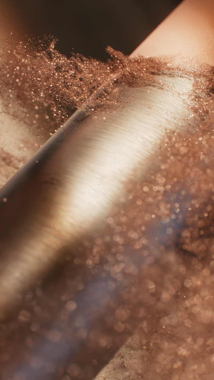 Animated sequence: A hand holding a glittery makeup brush, with the word "SURI" visible on the brush handle.