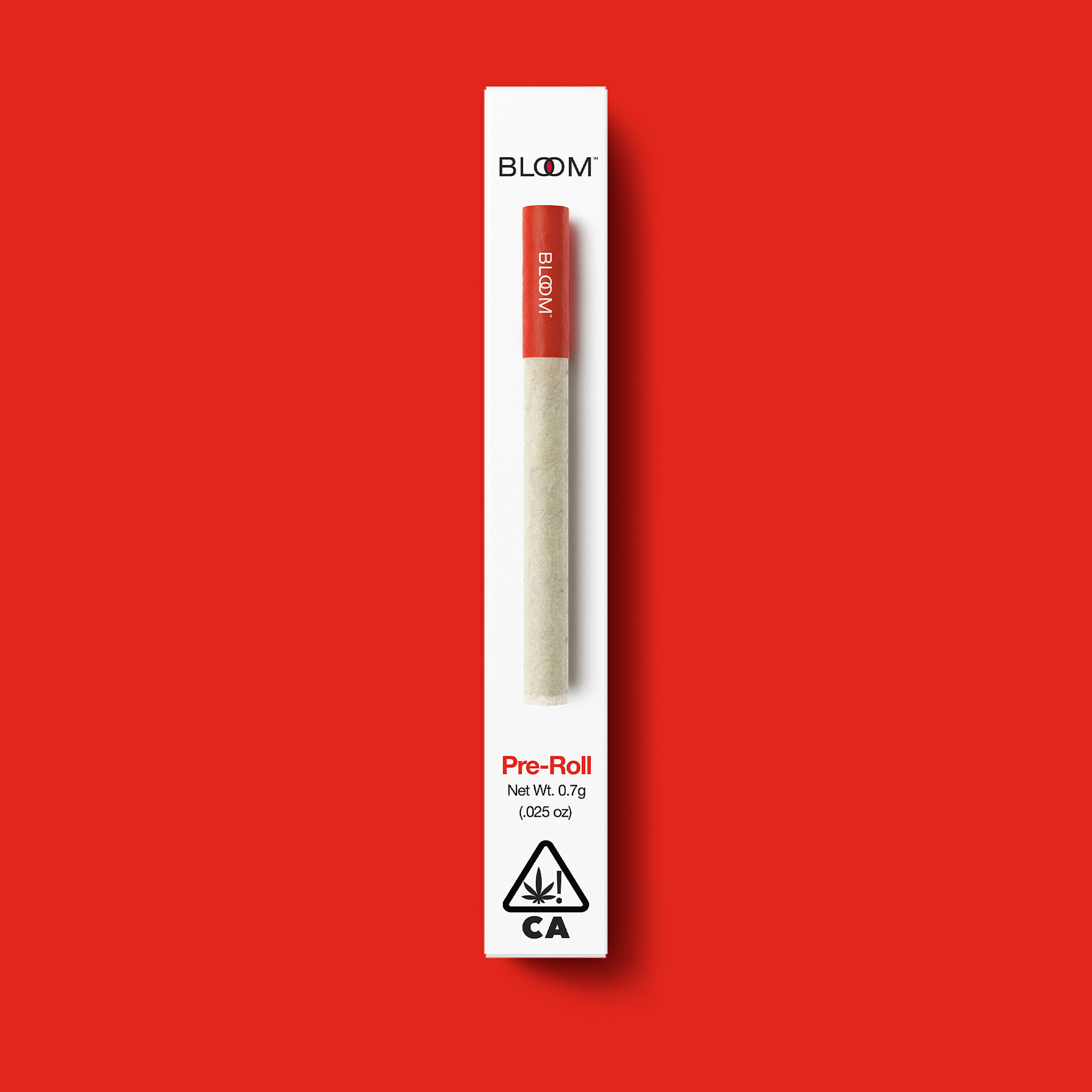 A red pre-roll with white paper, labeled "BLOOM" and "Pre-Roll," featuring a warning symbol and "CA" on a red background.