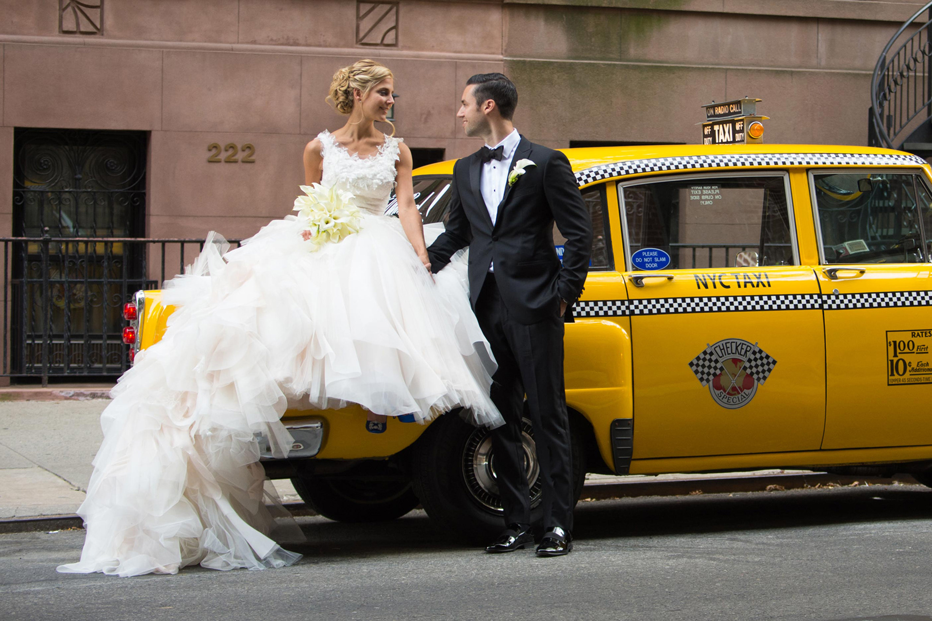 Sarah wanted something dramatic with lots of tulle and lace and organza. Photo credit: Camelot Photography Studios