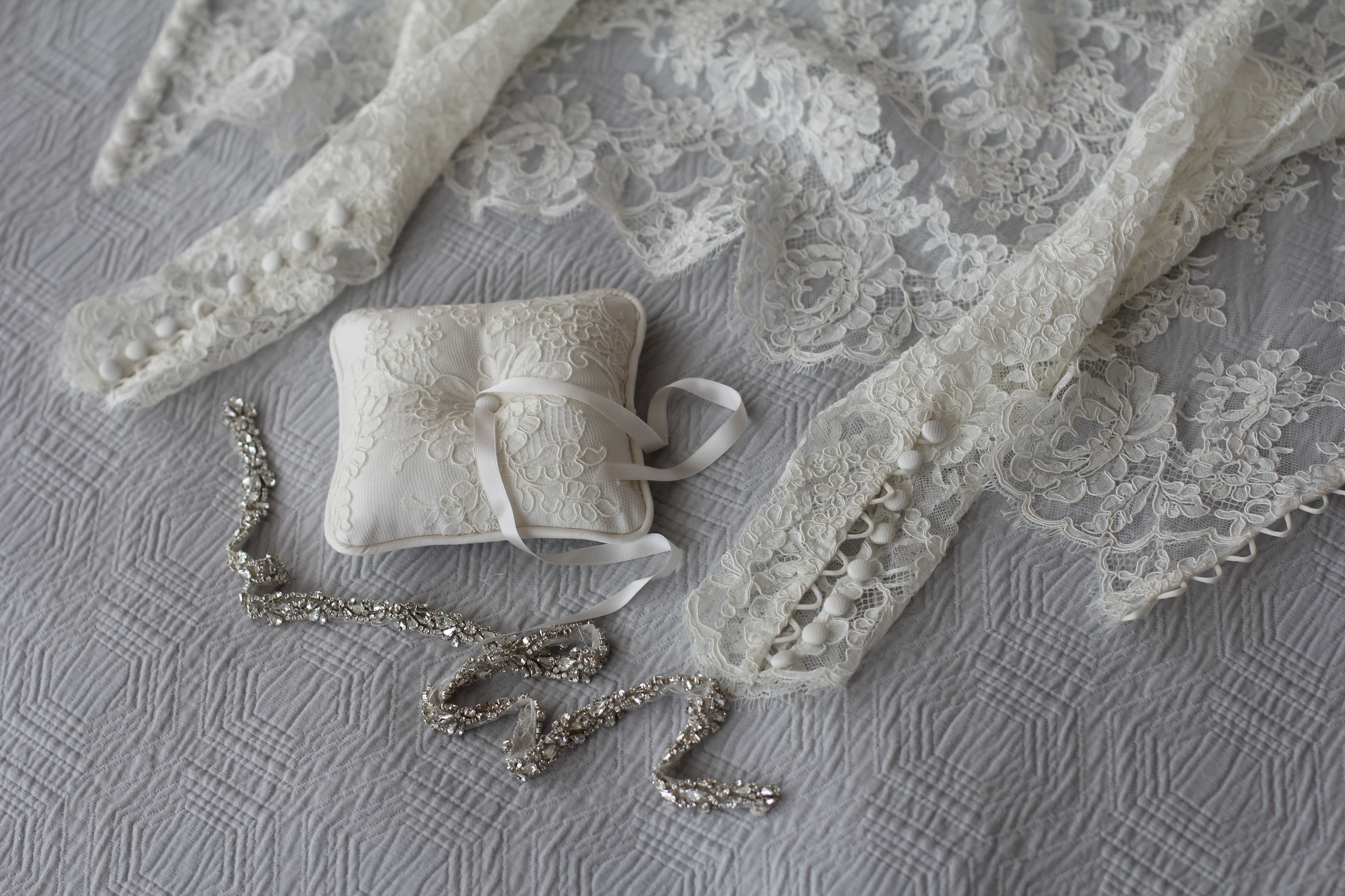 For Kristina I made a button-up lace bolero and a matching ring pillow. Photo credit: Colette Komm