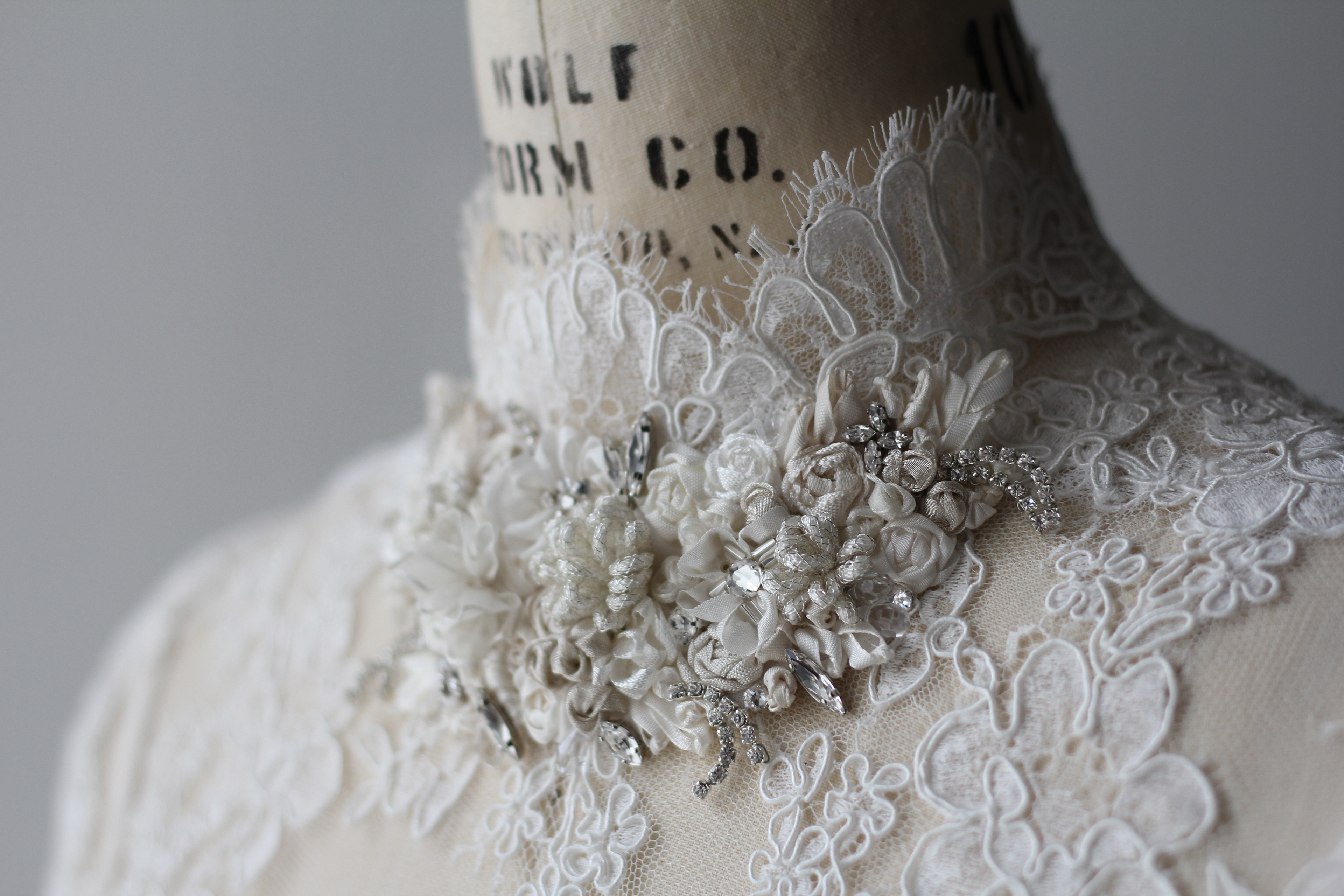 The silk ribbon embroidery I did on the neckline of Deneb's lace bodice. Photo credit: Colette Komm
