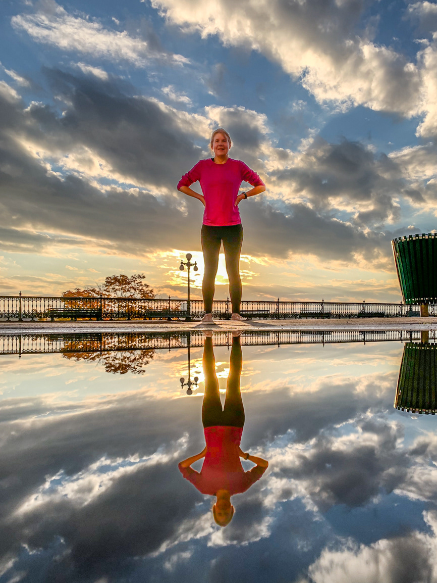 Reflection of Sue in the sunrise over the St. Lawrence River from the Dufferin Terrace - Quebec City, Quebec CA