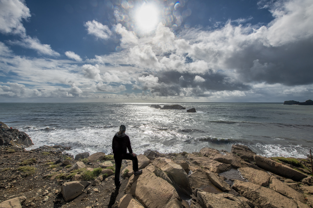 Sue looking south into the North Atlantic Ocean from the lower Dyrhólaey peninsula.