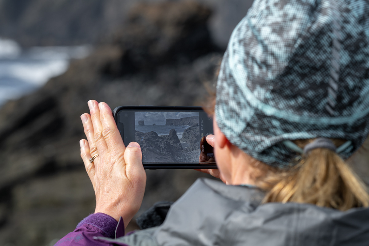Bob taking a picture of Sue taking a picture of the lava arch.