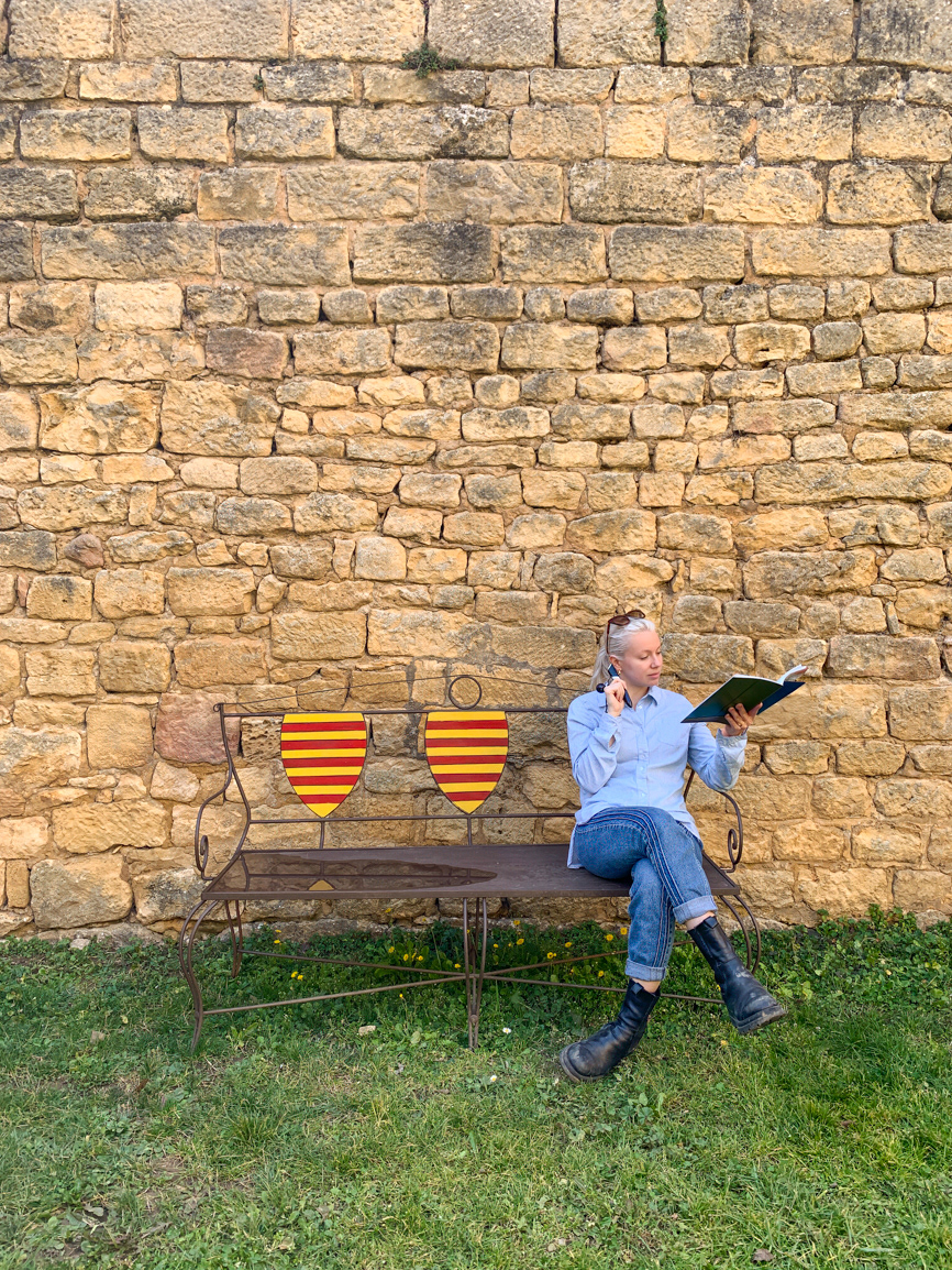 Catching up on some light reading at the Château de Beynac - Beynac-et-Cazenac, France