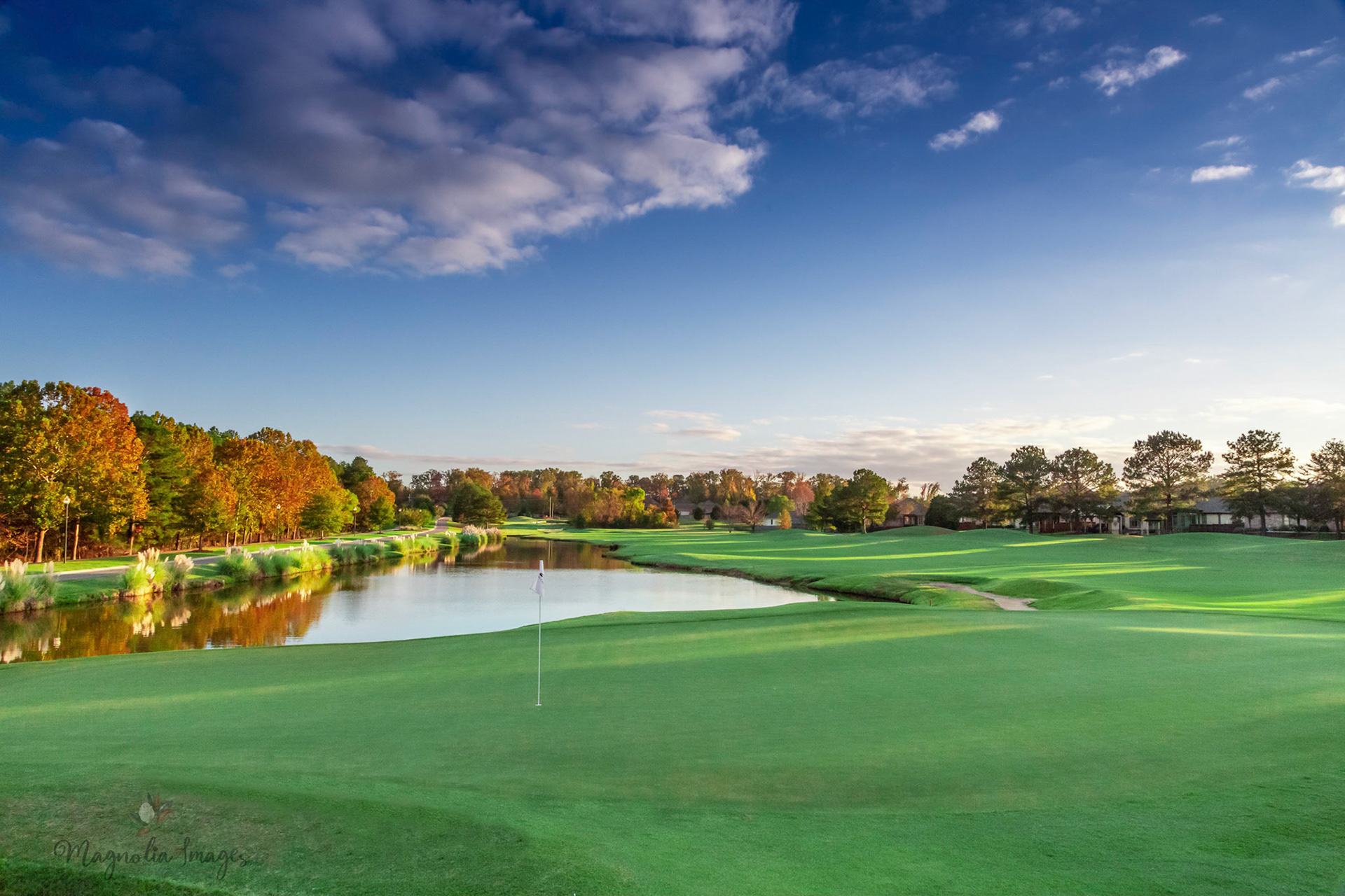 Fall colors reflecting on the water at No. 16