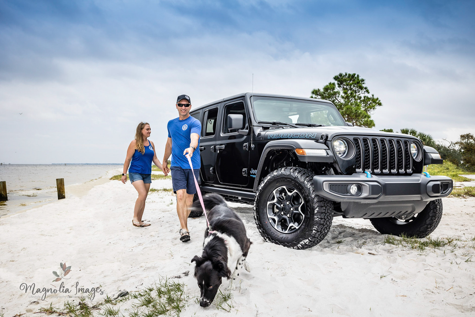 The hybrid Jeep Wrangler Xe shows off at the beach