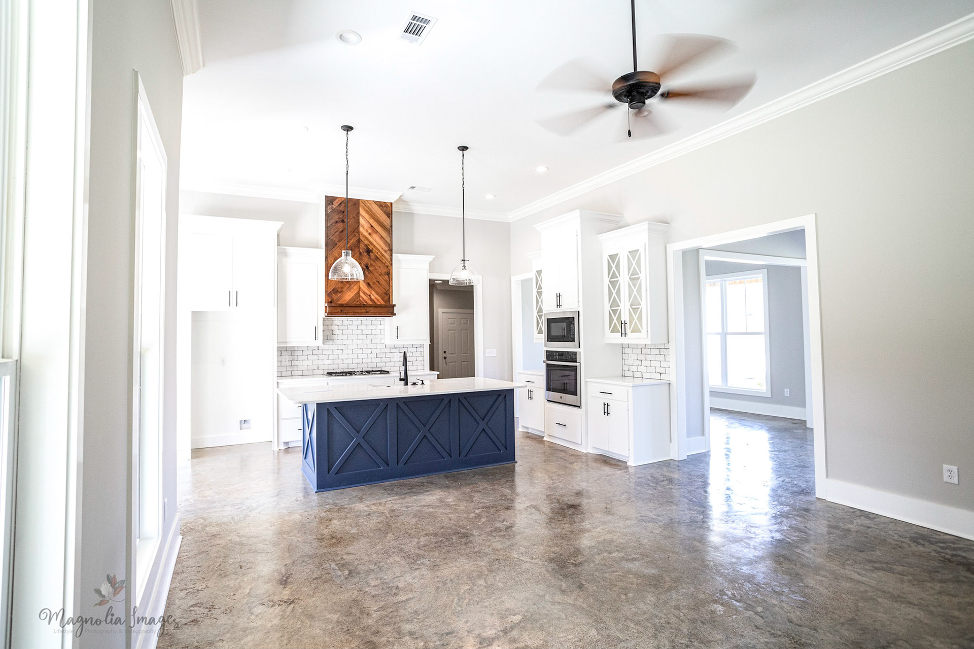 Living room, open kitchen, formal dining room. front entry hallway