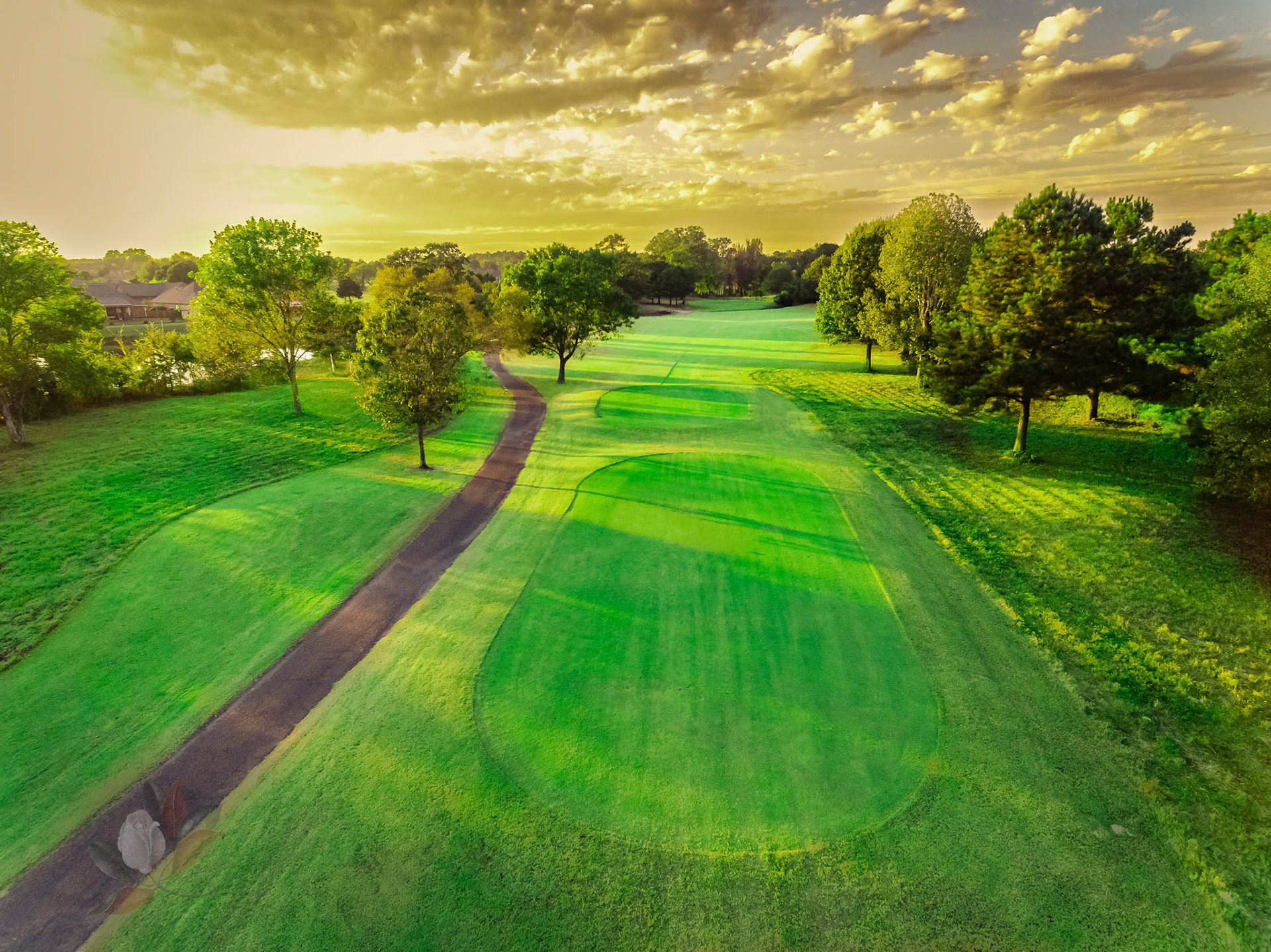 Late day sun highlights the multiple tee boxes on No. 2