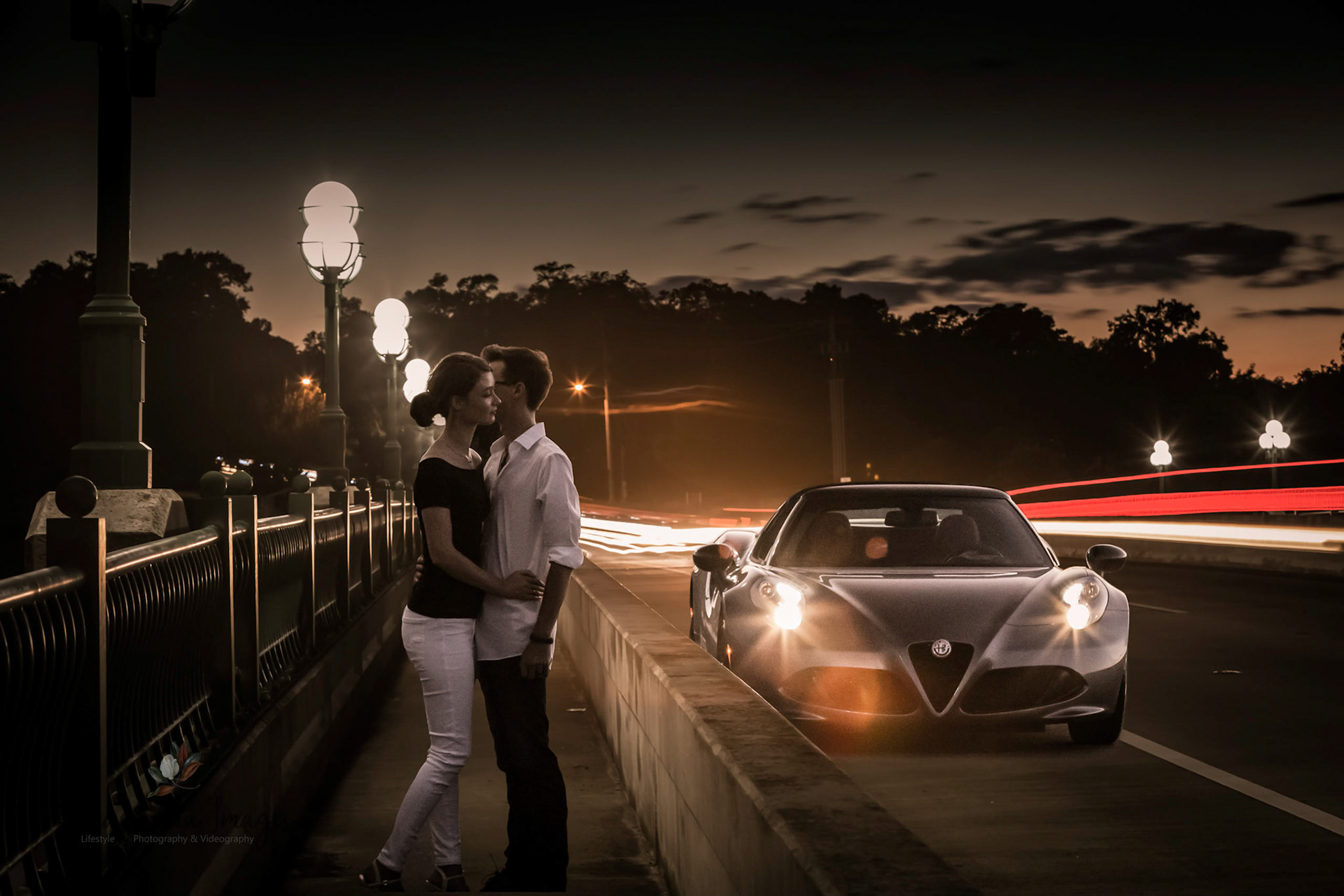 Power couple with their Alfa Romeo 4C Spider