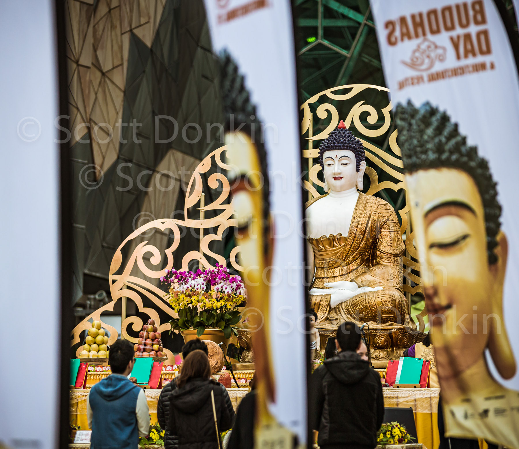 MELBOURNE, VIC, AUSTRALIA - 21 May 2017: The Buddha's Day and Multicultural Festival, held on Federation Square, showcased artists and performers from a variety of cultures and countries. The entertainment highlights were Flamenco and Bollywood dancing, choir singing and aboriginal performances.  The festivities also included Chinese Calligraphy workshops, Tai Chi sessions, vegetarian cooking demonstrations and Bathing The Buddha ceremonies.