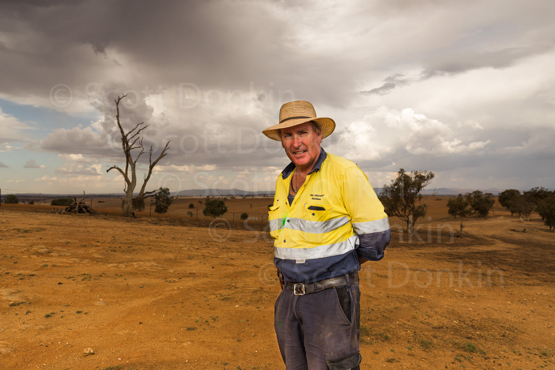 JUNEE, NSW, AUSTRALIA - 3 February 2019: Martin Honner, a fourth generation farmer in this area, stands on his drought affected property, "Mt Pleasant".