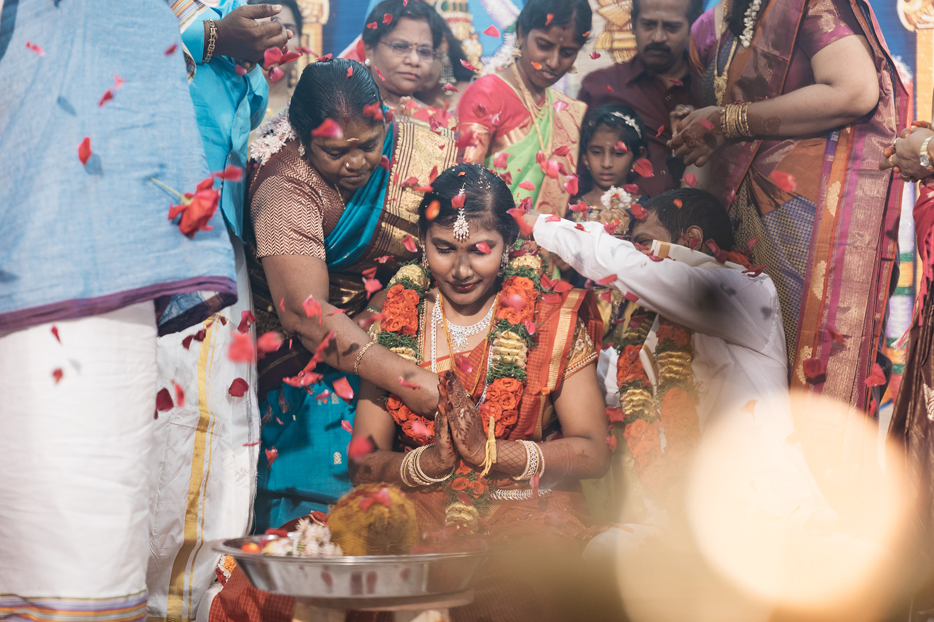 He finishes tieing three knots