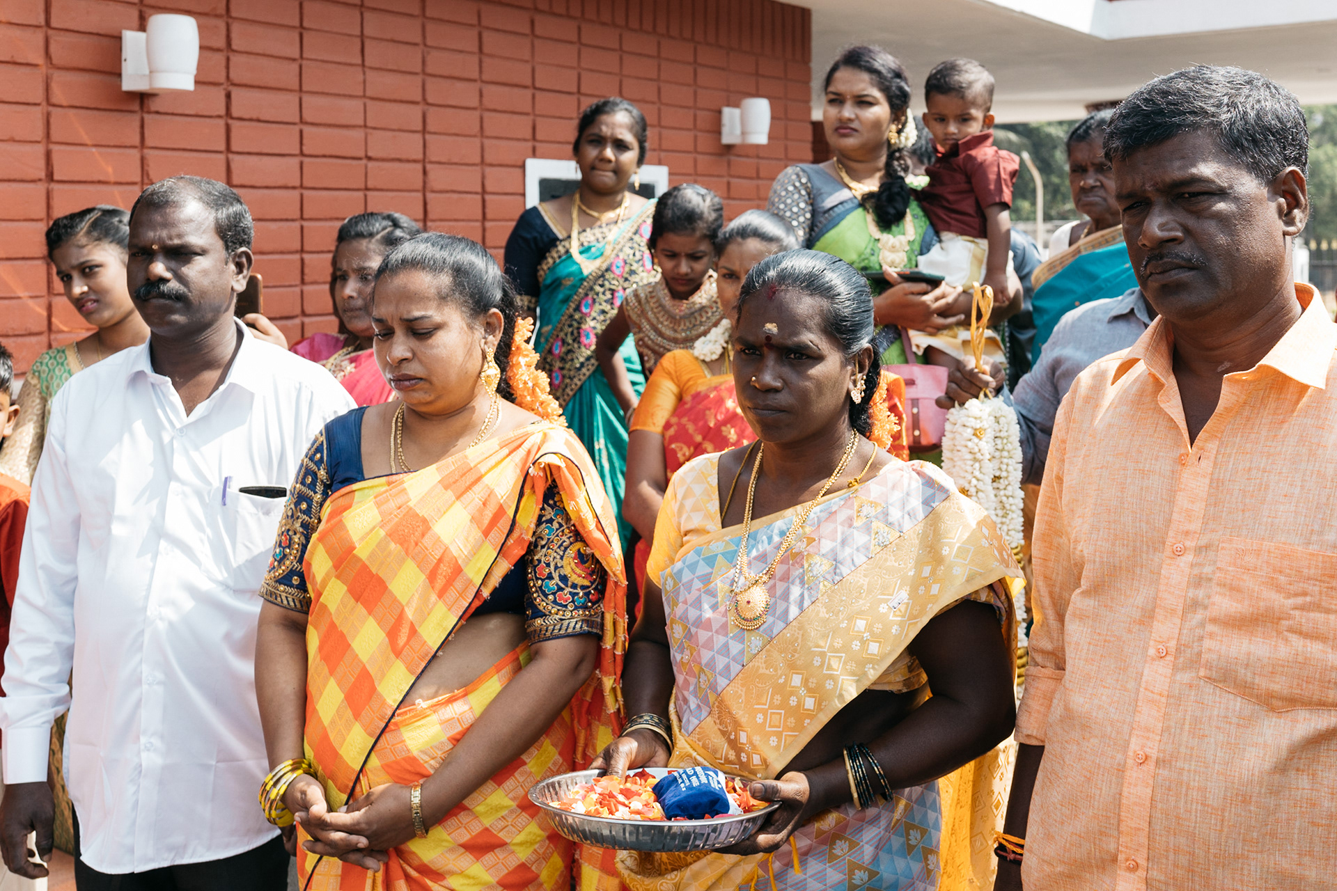 Parents and guests paying attention to vows