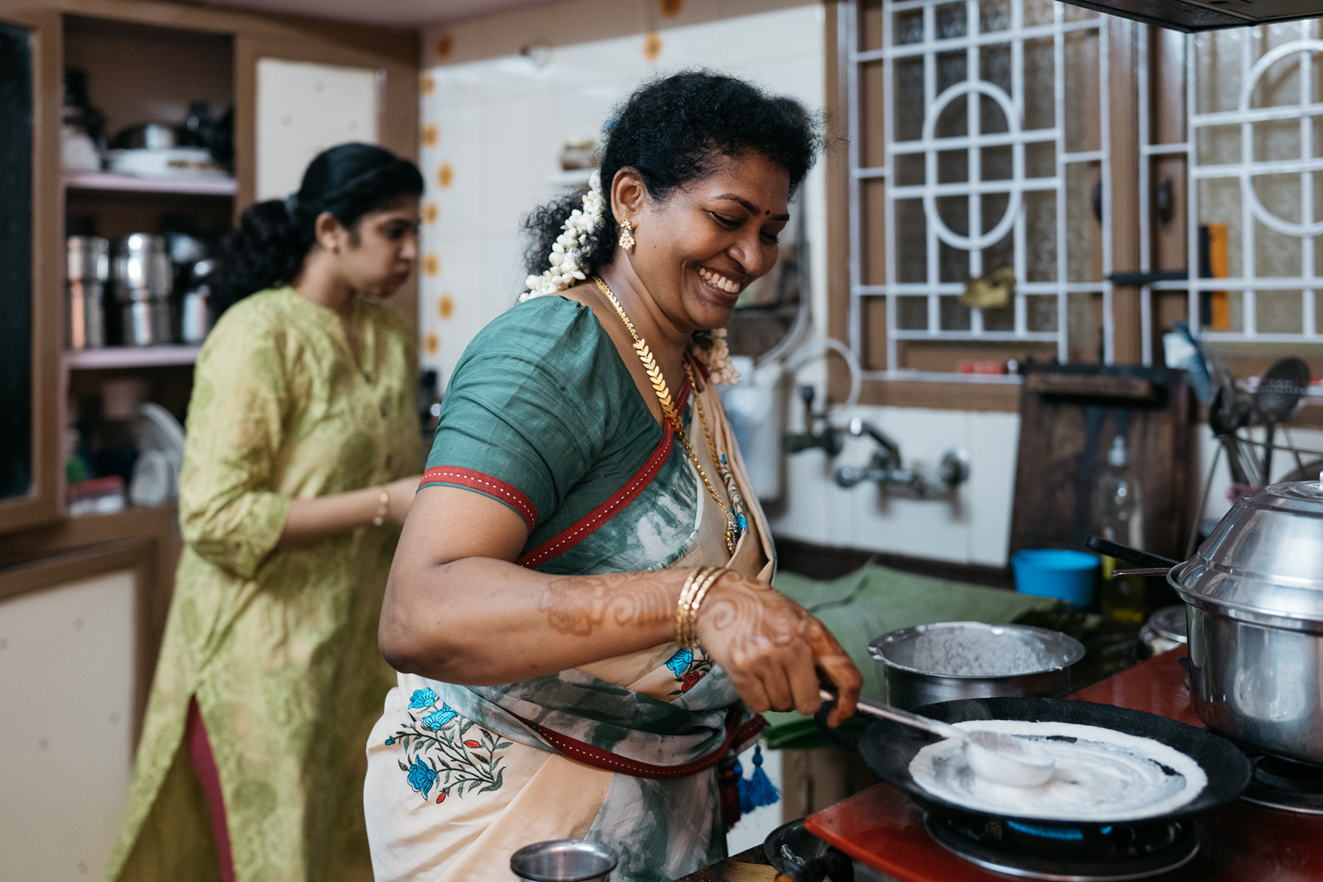 Mom making dosa