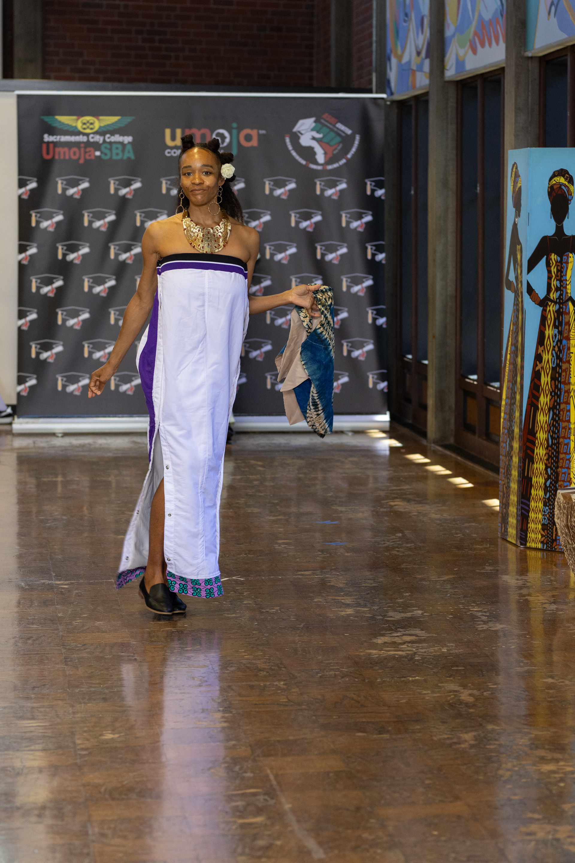 Problem: No contour of tear away pants. Solution: used small darts in back of dress.