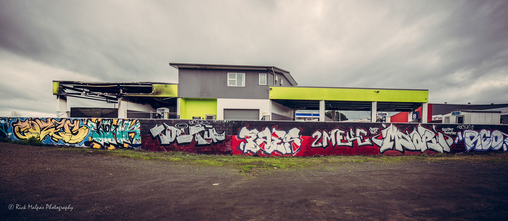 Graffiti & fire-damaged service station, Gt South rd