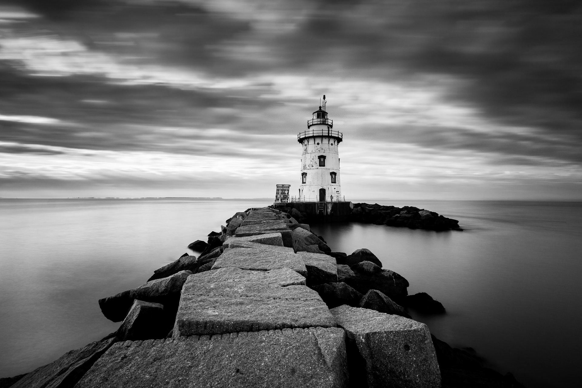 Black and white long exposure of Saybrook Breakwater Light
