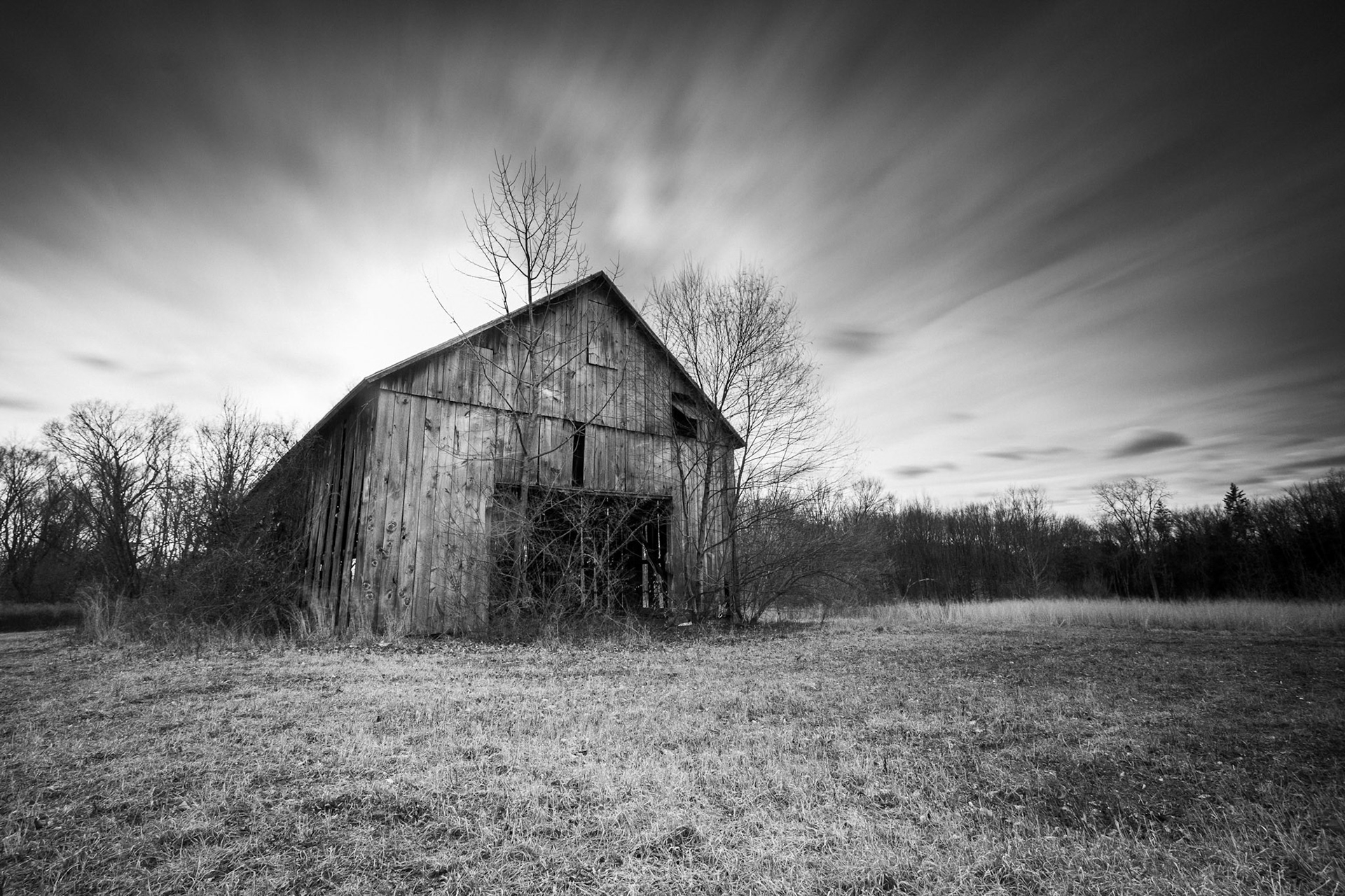 Black and white rustic barn long exposure.