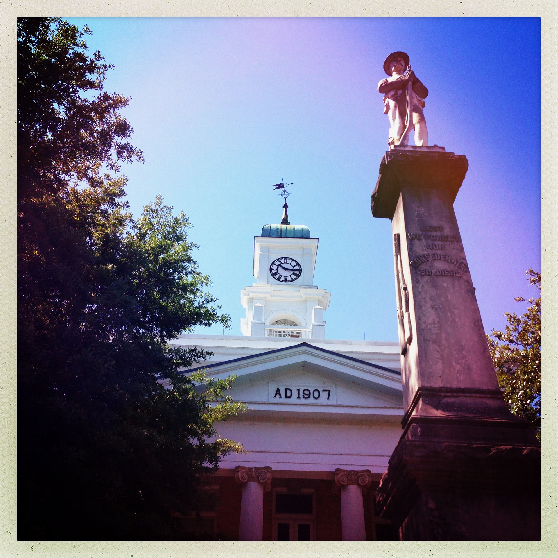 Evans and Agee met Floyd Burroughs, Frank Tingle and Bud Fields standing beneath this statue at the county courthouse. They were applying for federal assistance but did not qualify.