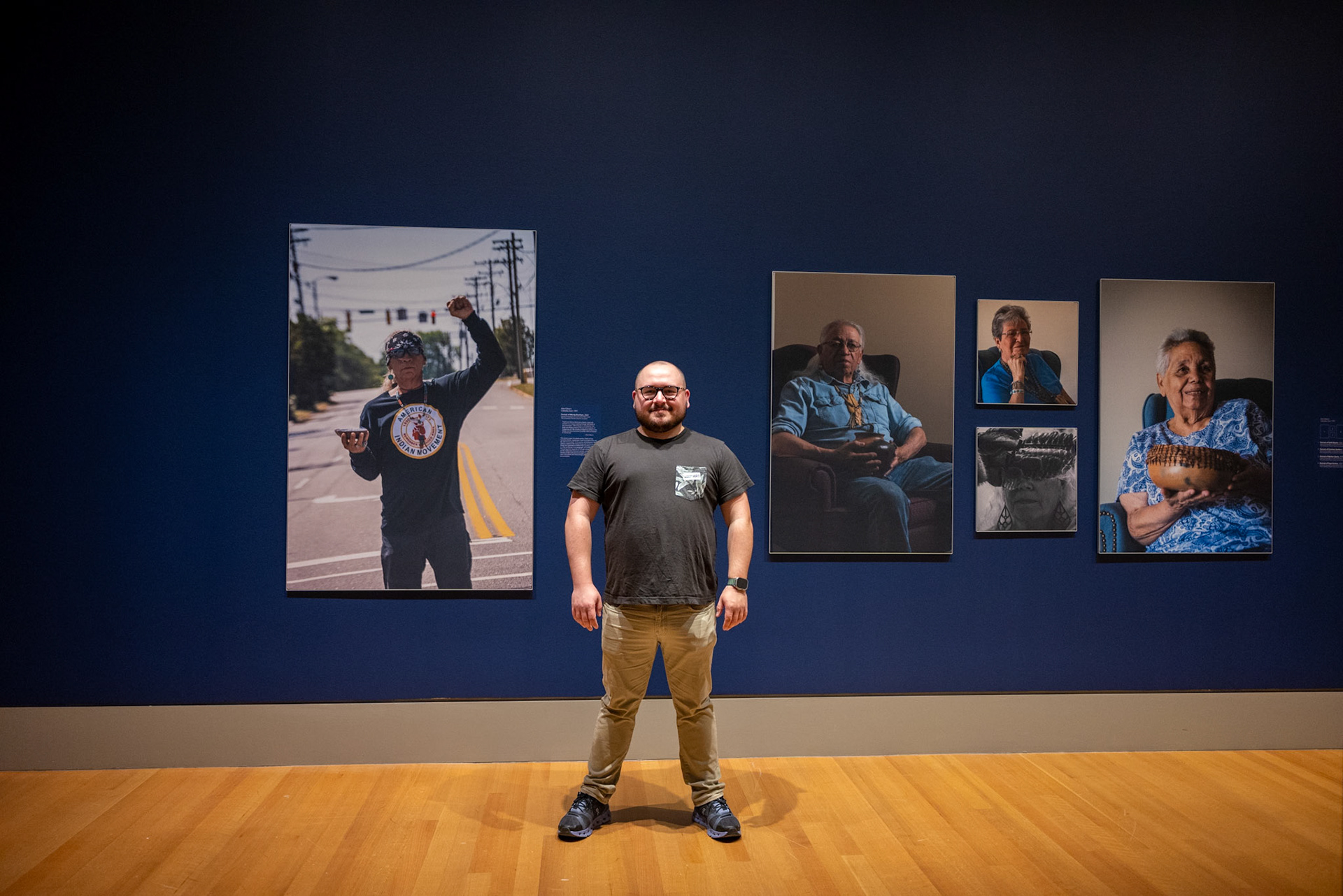 The artist with a selection of images from his "Discussions with Elders" series developed for the Native American Studies Center at the University of South Carolina Lancaster.