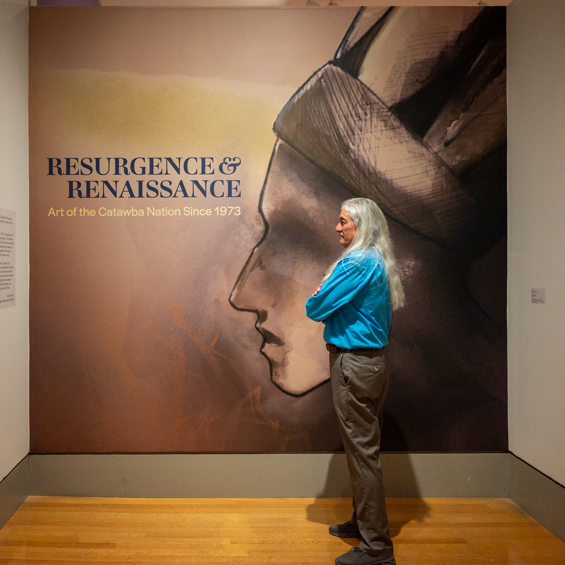Then Chief Bill Harris views the gallery at the Columbia Museum of Art on opening day.