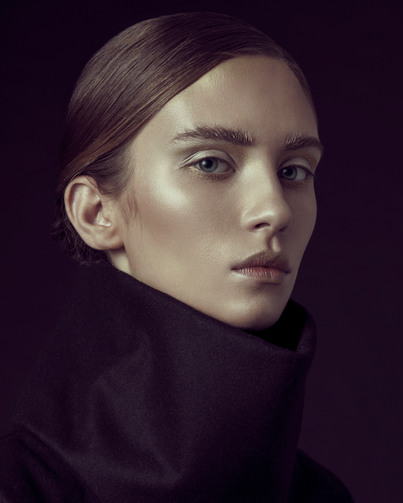 Minimalist studio fashion portrait with black high-neck styling – Joanna Kustra commercial photography