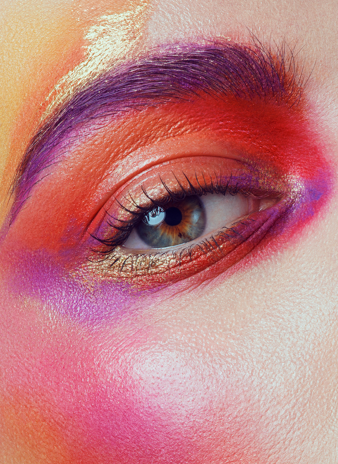 Creative beauty close-up with vibrant red and purple eye makeup – Joanna Kustra, high-fashion beauty photography