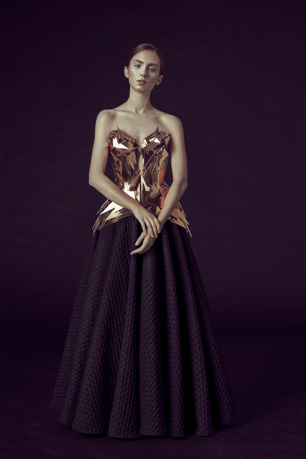 Studio fashion portrait in black skirt with gold metallic corset – Joanna Kustra couture fashion photography