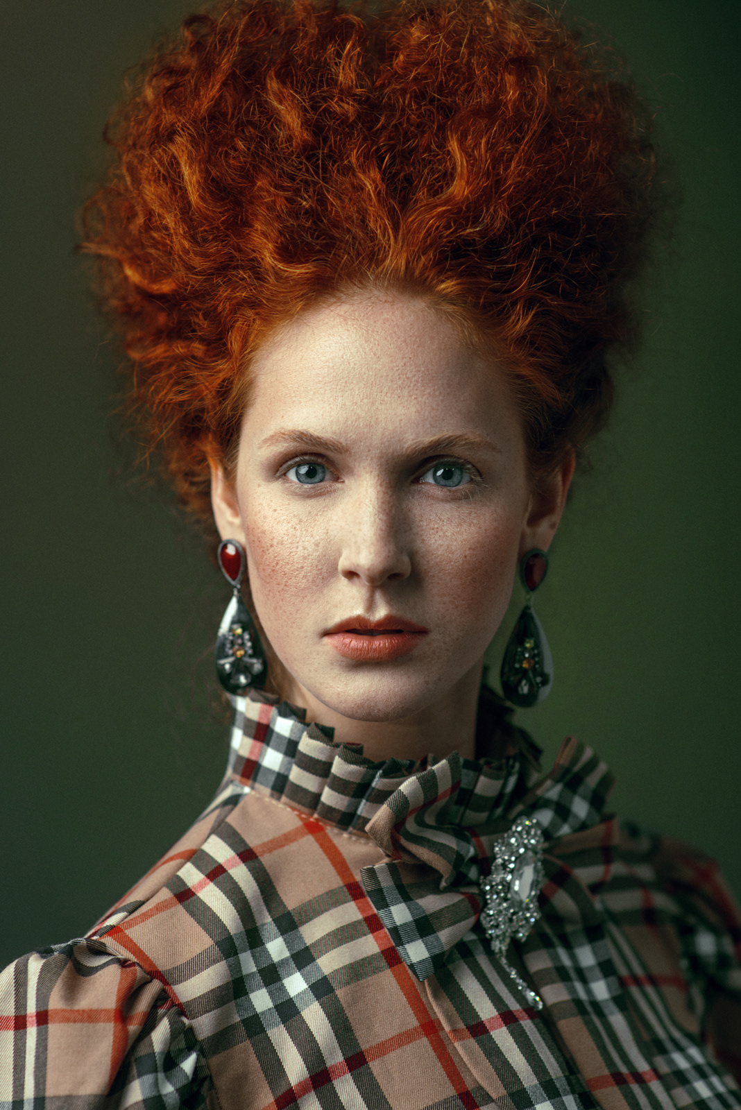 Fine art portrait of red-haired model in plaid blouse with statement earrings – Joanna Kustra vintage-inspired photography