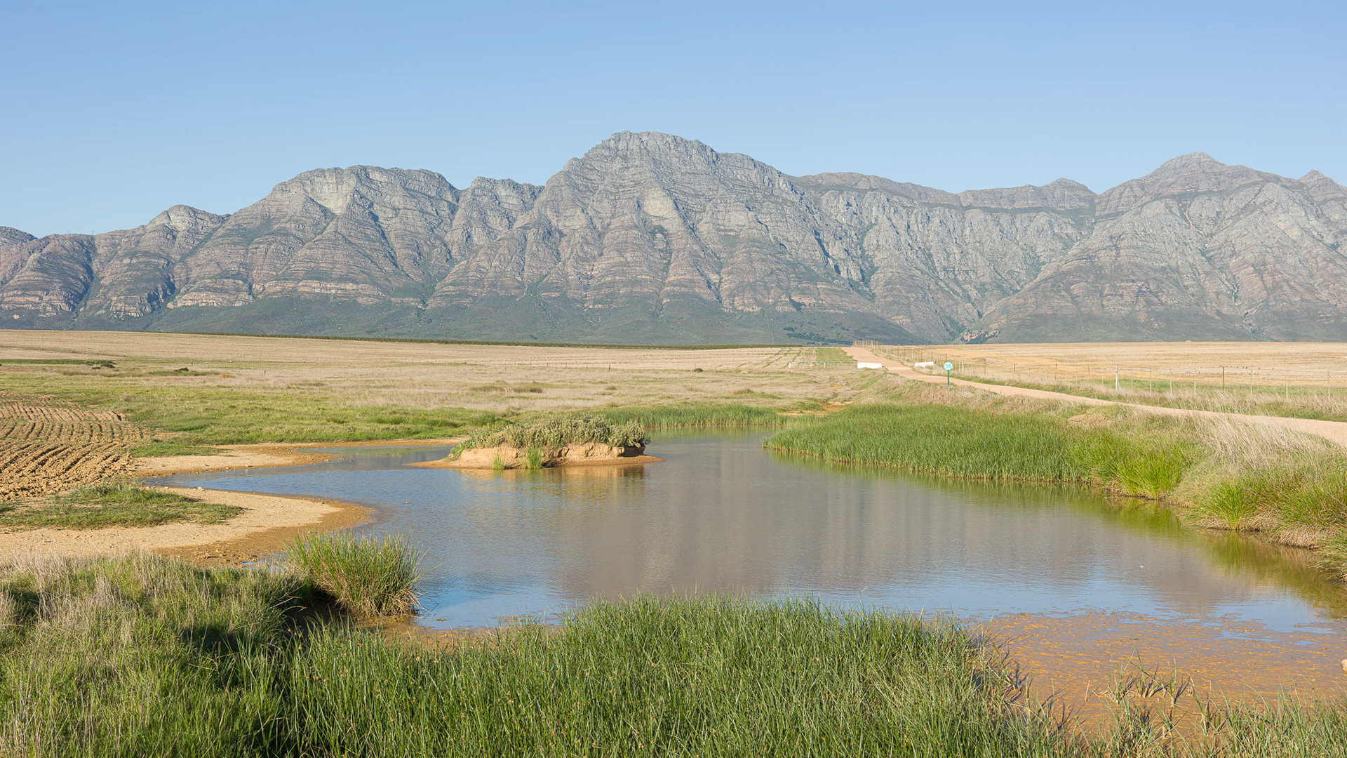  Farm dam and the Elandskloof Mountains from the Bo-Hermon Road