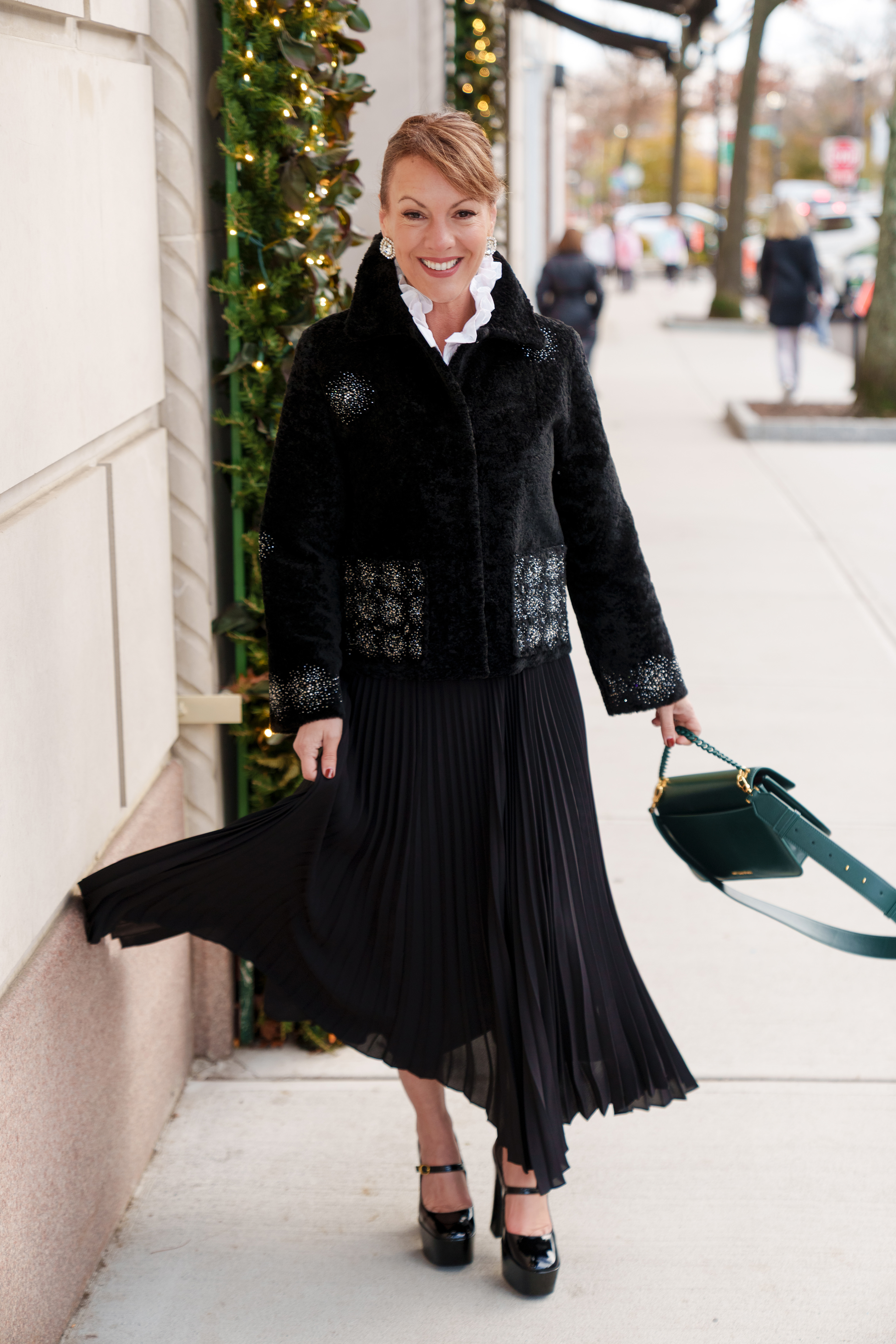 Pologeorgis fur coat with silver embellishments, with Tina wearing it on the Avenue at Christmas time