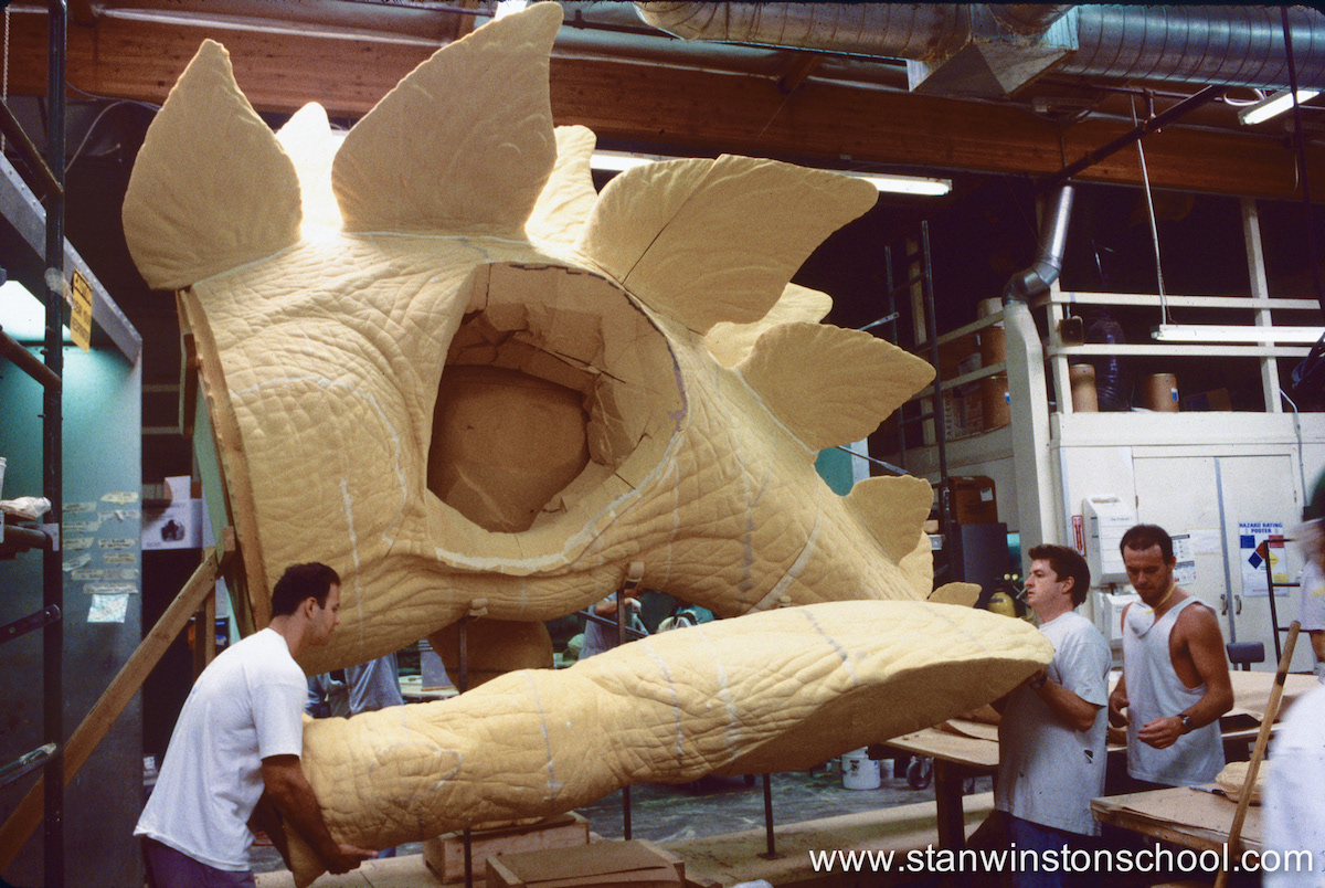 Me and Mark Maitre moving the full sized stegosaurus left foam leg into place on the body.