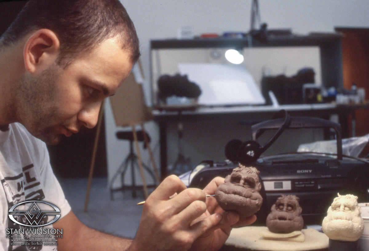Each character had a main expression head but also had a few extra expression heads in case a scene called for a facial change. Here I am sculpting a "smile" face.