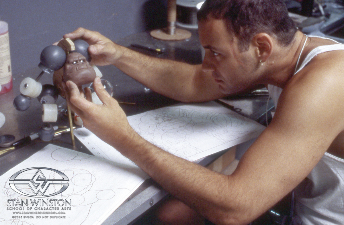 Checking how far the head ball joint must sit in relation to the shoulders.