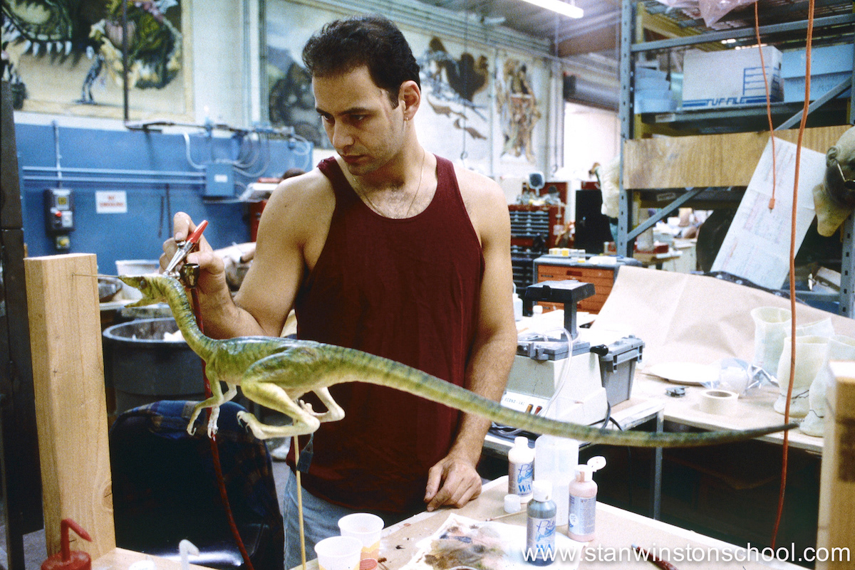 Painting Compsognathus "Compy" puppet.