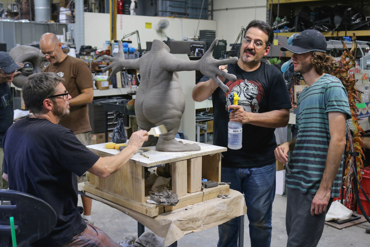 Paul Mejias and Mark Maitre adding the skin wrinkle detail to the Alien while Derek Rosengrant takes pointers to match his areas.
