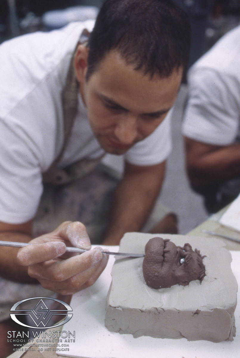 Back in the day, I did many tasks at work... here I am laying up a mold for Slamfist's main expression head.