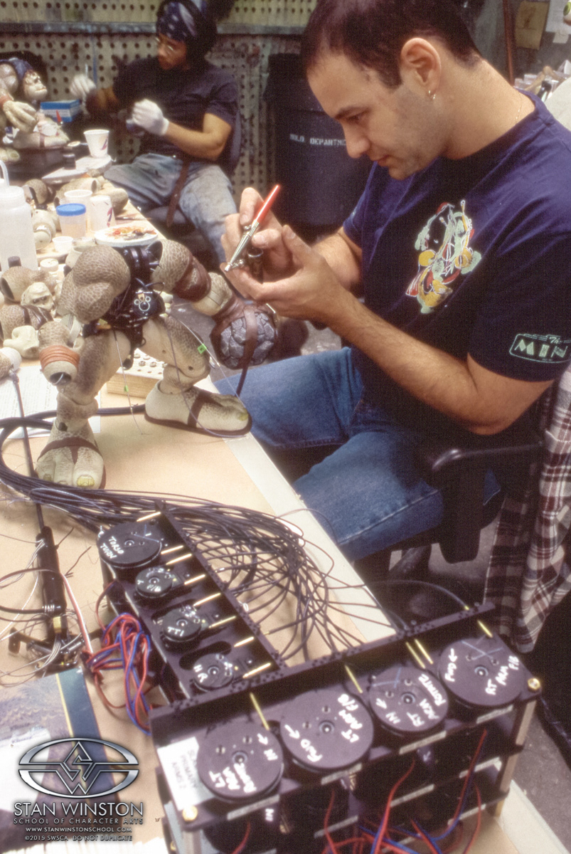The final touches on the paint scheme had to be applied after the shells were assembled onto the actual animatronic puppet. Mostly to paint the joint screws to match the arms and legs.