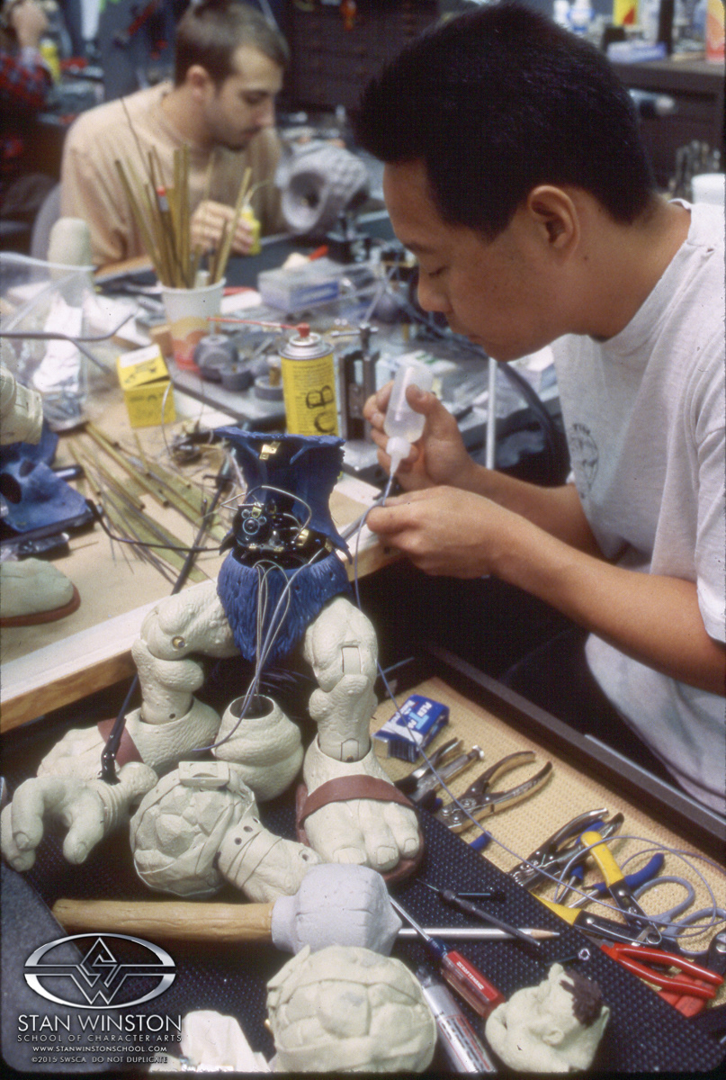 Mechanical designer Bob Mano was assigned to help bring Slamfist to "life". All of the characters had to be carefully cast as hollow shells so the mechanics could begin to fit their interior creations inside.