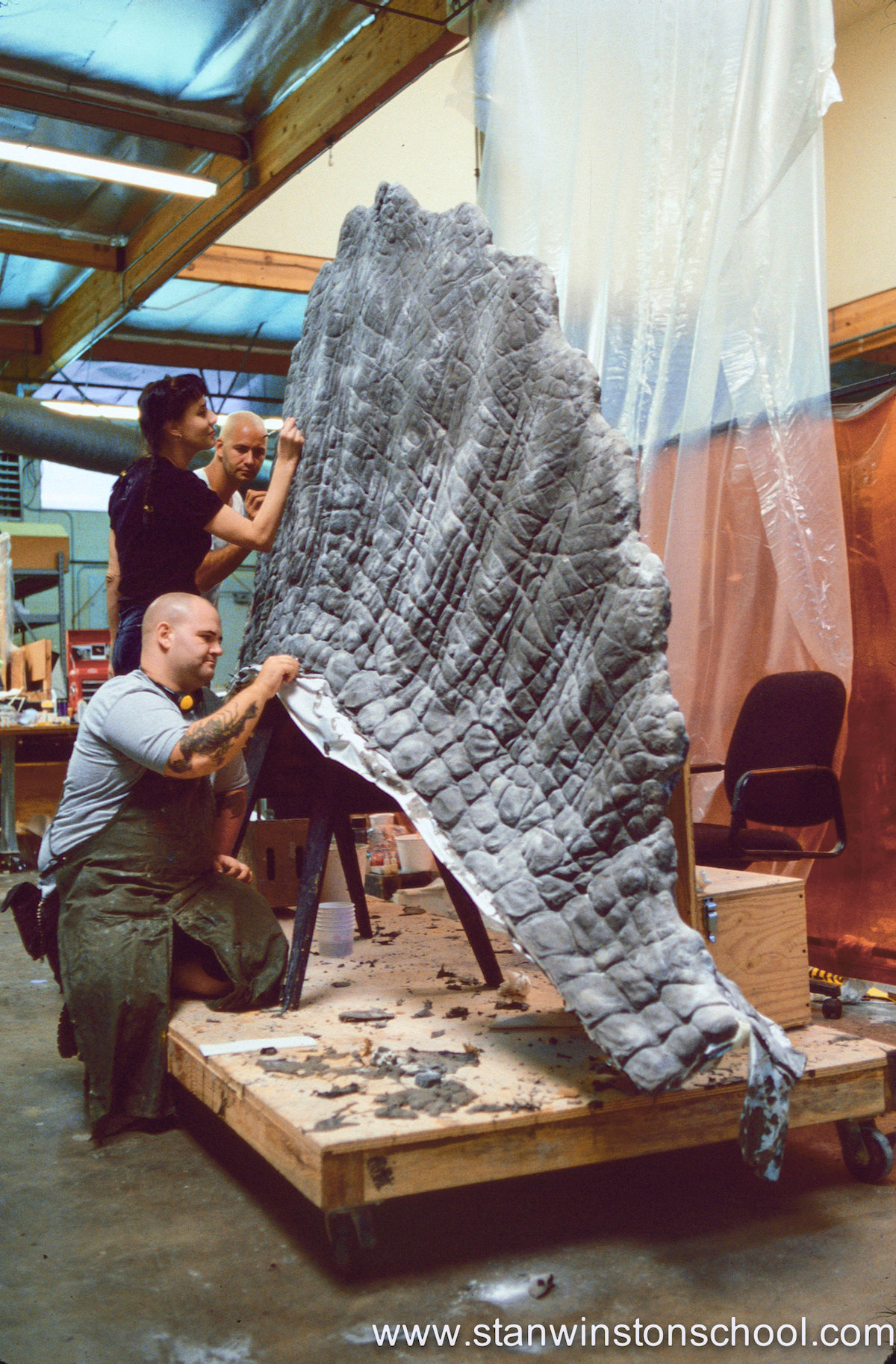 Working on the giant back fin of the Spinosaurus animatronic puppet.