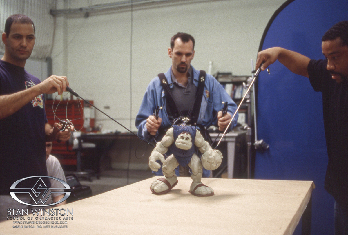 As we practice we watch a monitor showing a live video feed of our performances to help us critique ourselves.