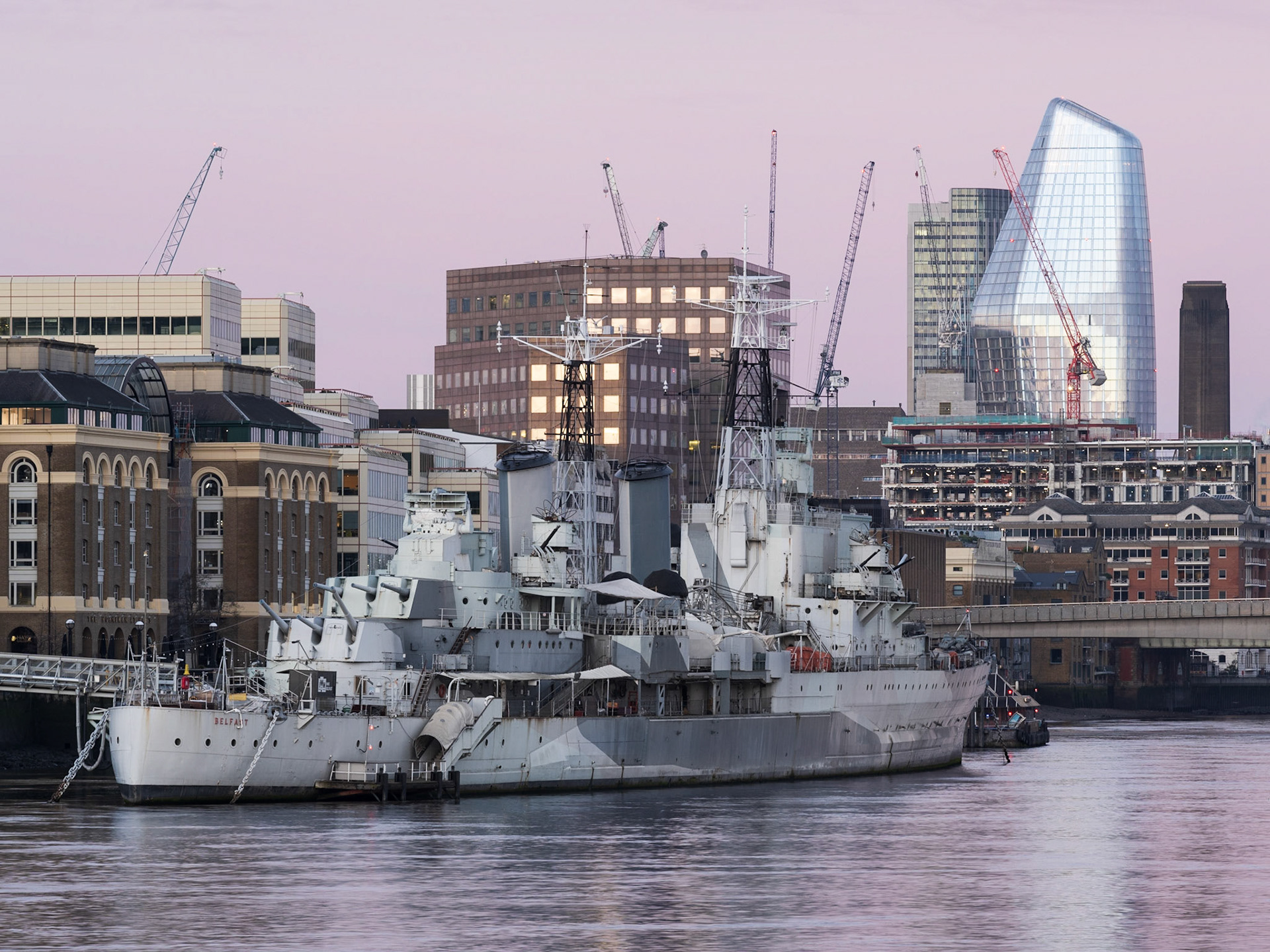 HMS Belfast & surrounding developing cityscape, London. Costas Kariolis