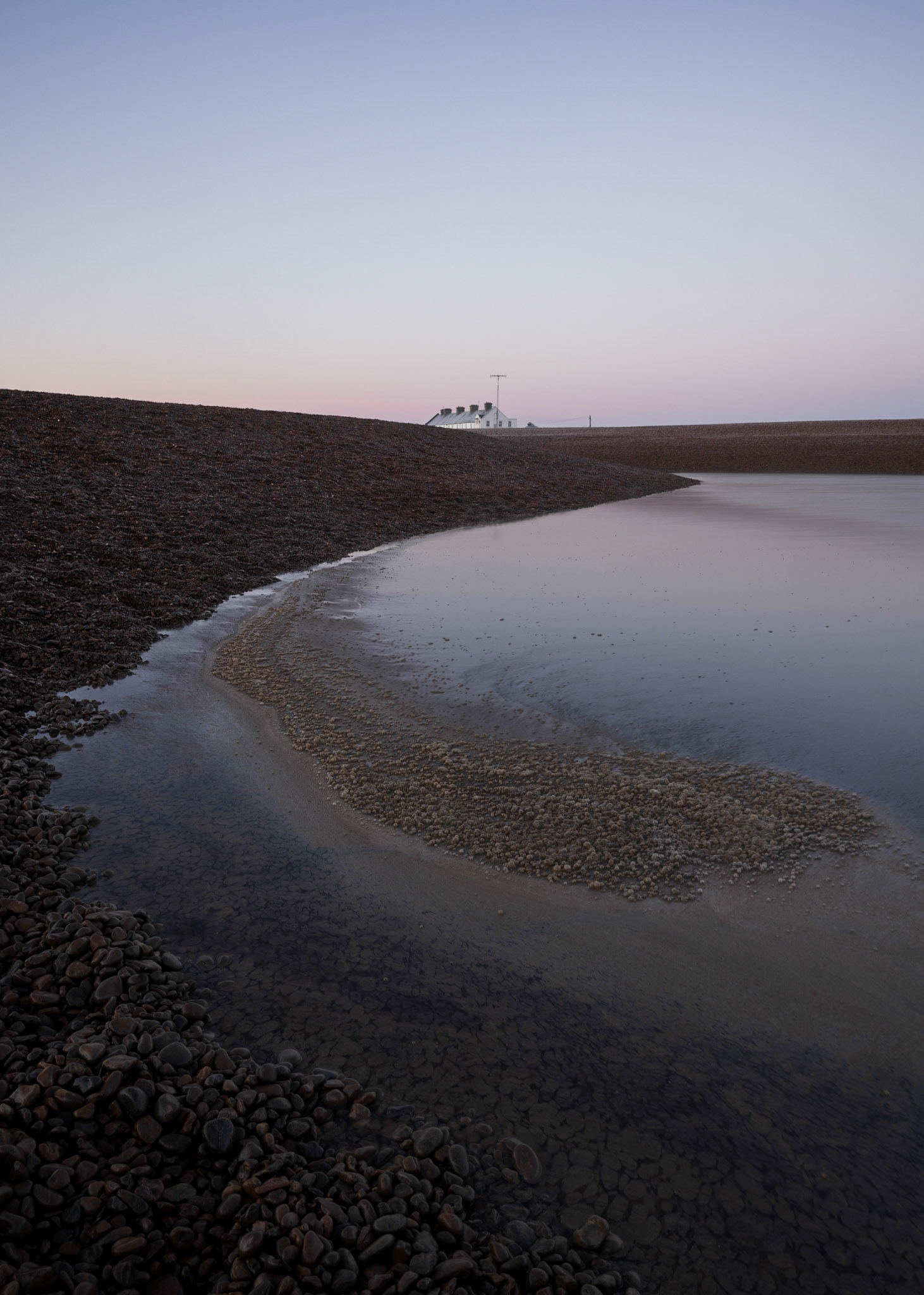 Suffolk coastal cottage during winter sunrise. Costas Kariolis