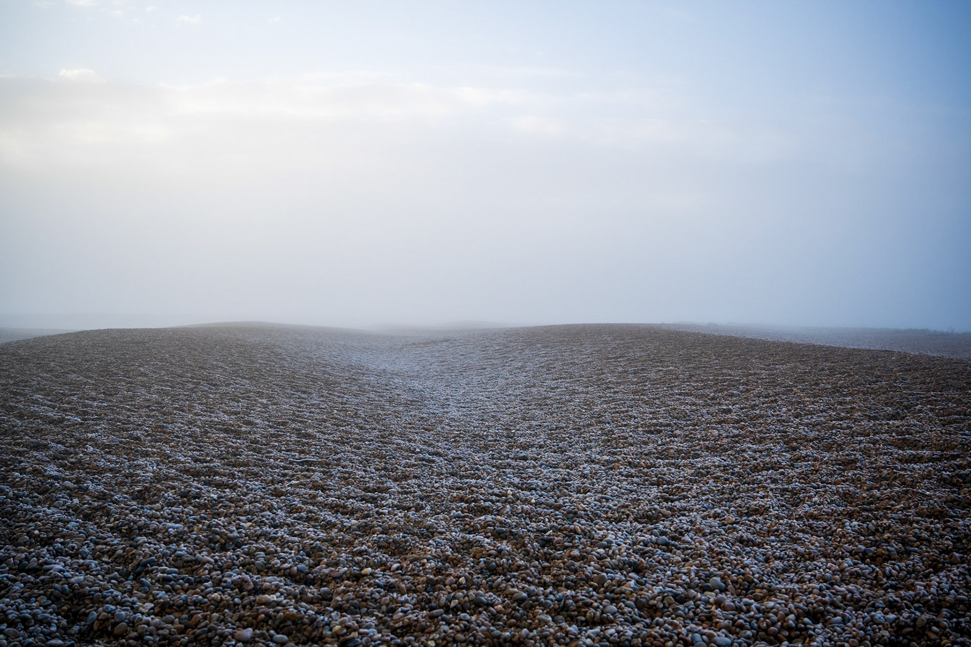 Frosty morning along shingle beach, Suffolk